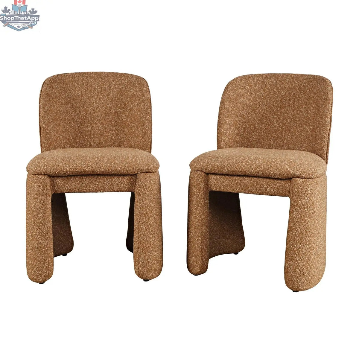 Hygge Design House Soma dining chair with beige fabric upholstery and wooden legs, stylishly displayed in a modern dining room setting.