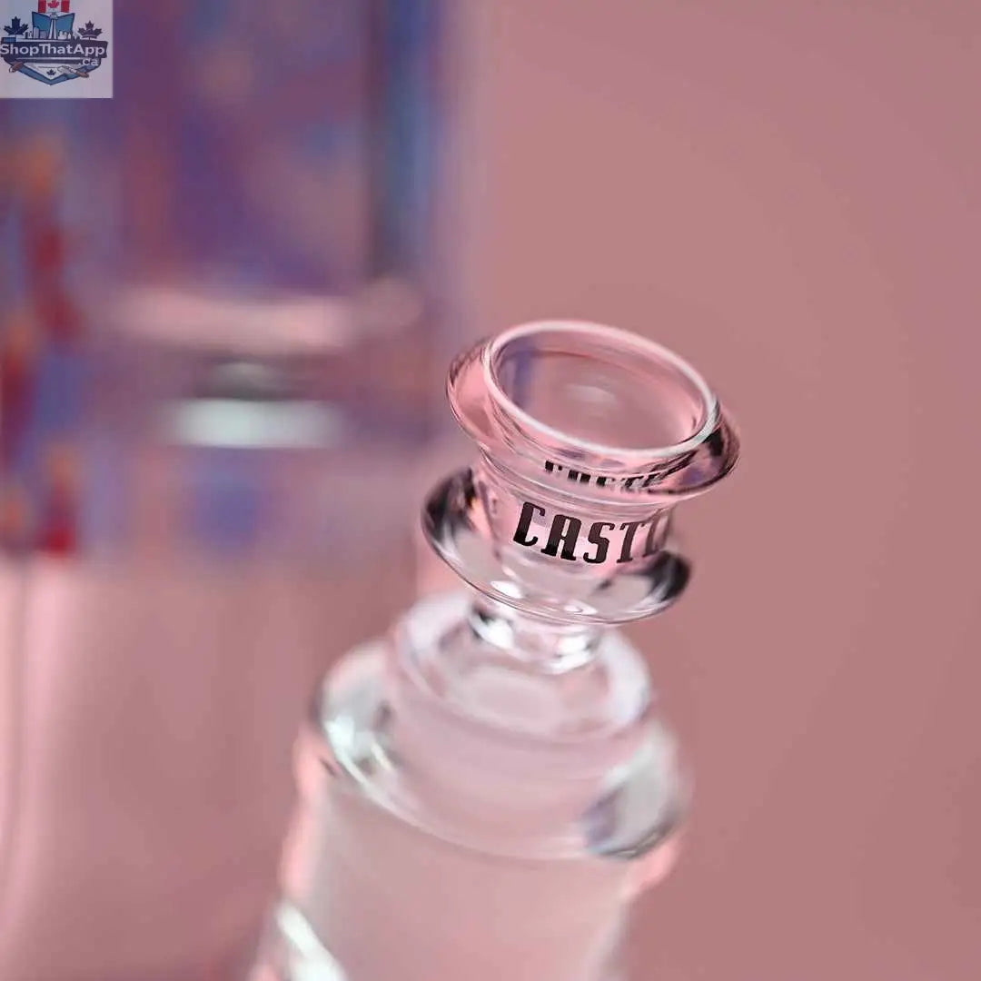 Close-up of 18-inch Alien beaker bong by Castle Glassworks, featuring pink background and detailed glass bowl.