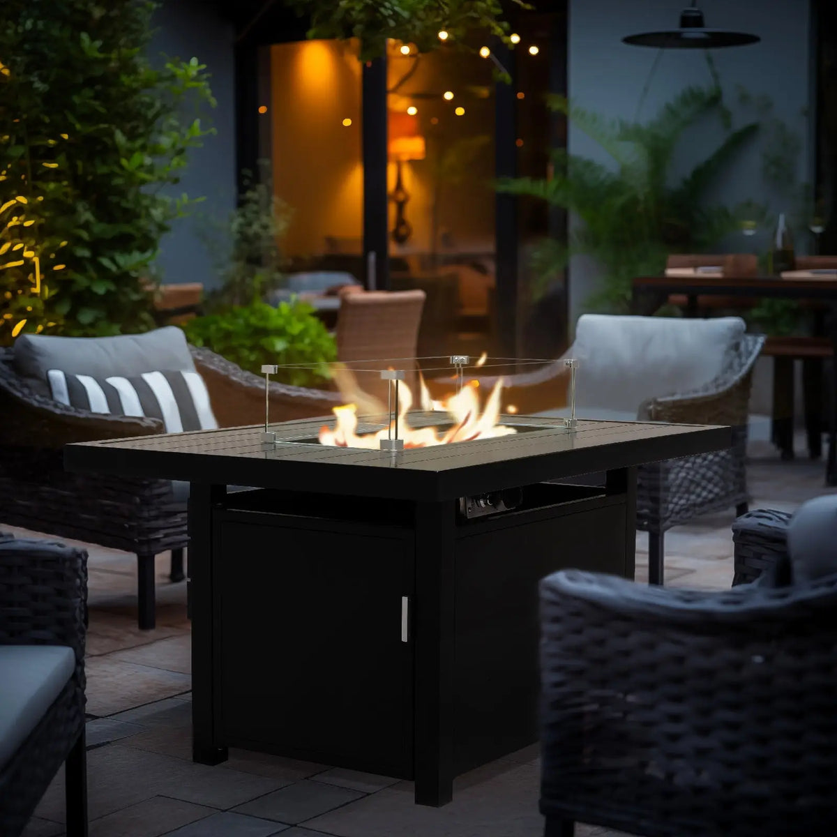 Black rectangular outdoor aluminum fire pit table with wind guard and cover, designed for outdoor use by Enclover.