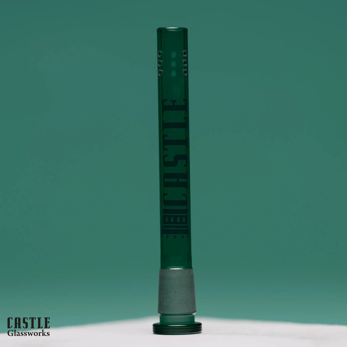 Castle Glassworks 5.75-inch 9-hole replacement downstem made of durable borosilicate glass for smoking devices.