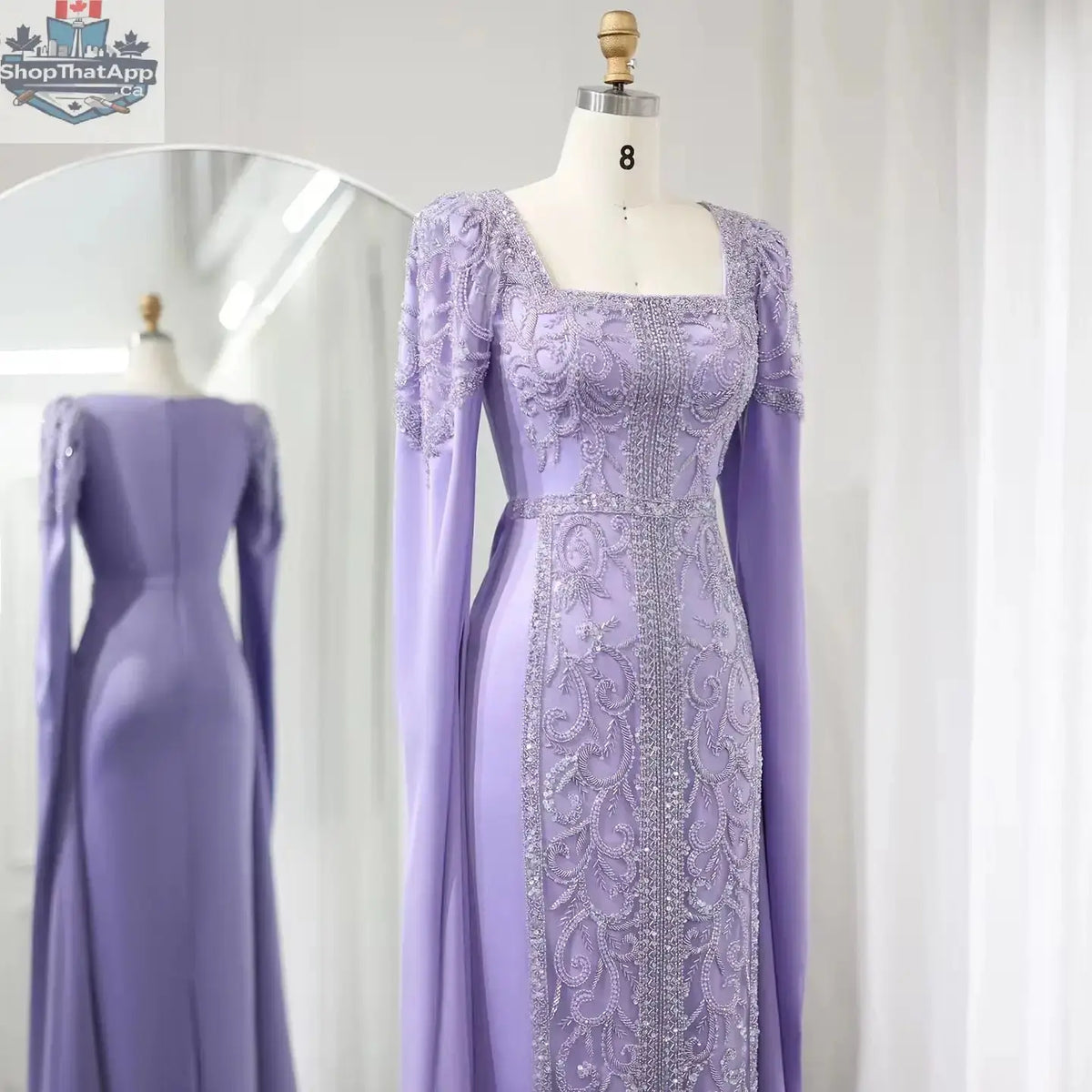 Elegant Threads kaftan style evening gown with cape sleeves, perfect for elegant occasions, shown on a model.