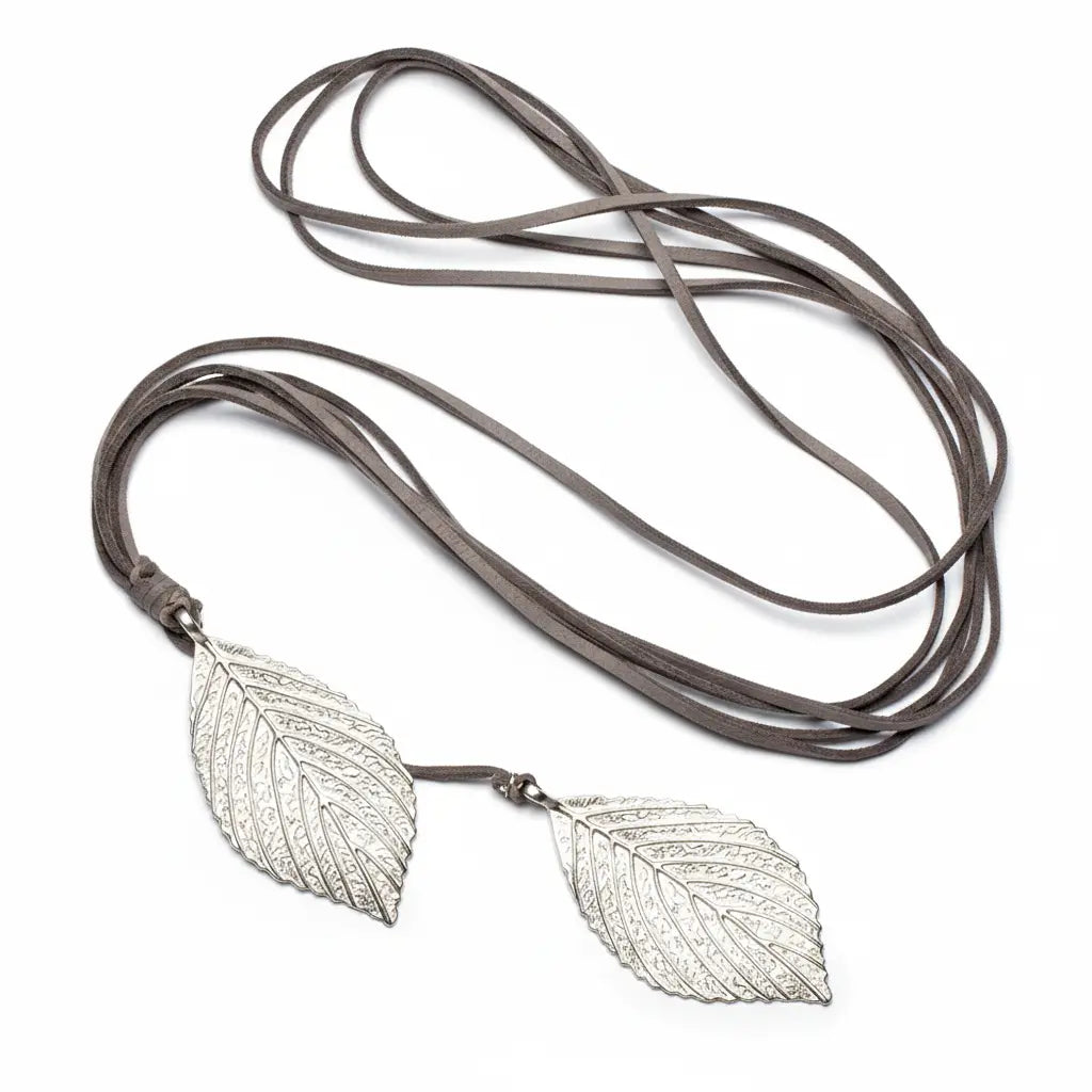 Silver-plated double leaf necklace on suede cord by Suzie Blue Canada, showcasing detailed leaf design and elegant craftsmanship.