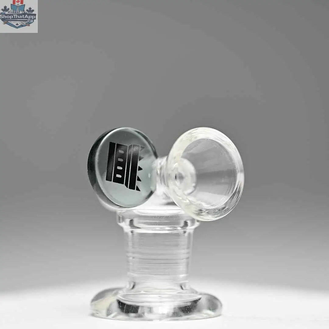 Castle Glassworks 14mm borosilicate glass round tab bowl with transparent grey finish on a grey background.