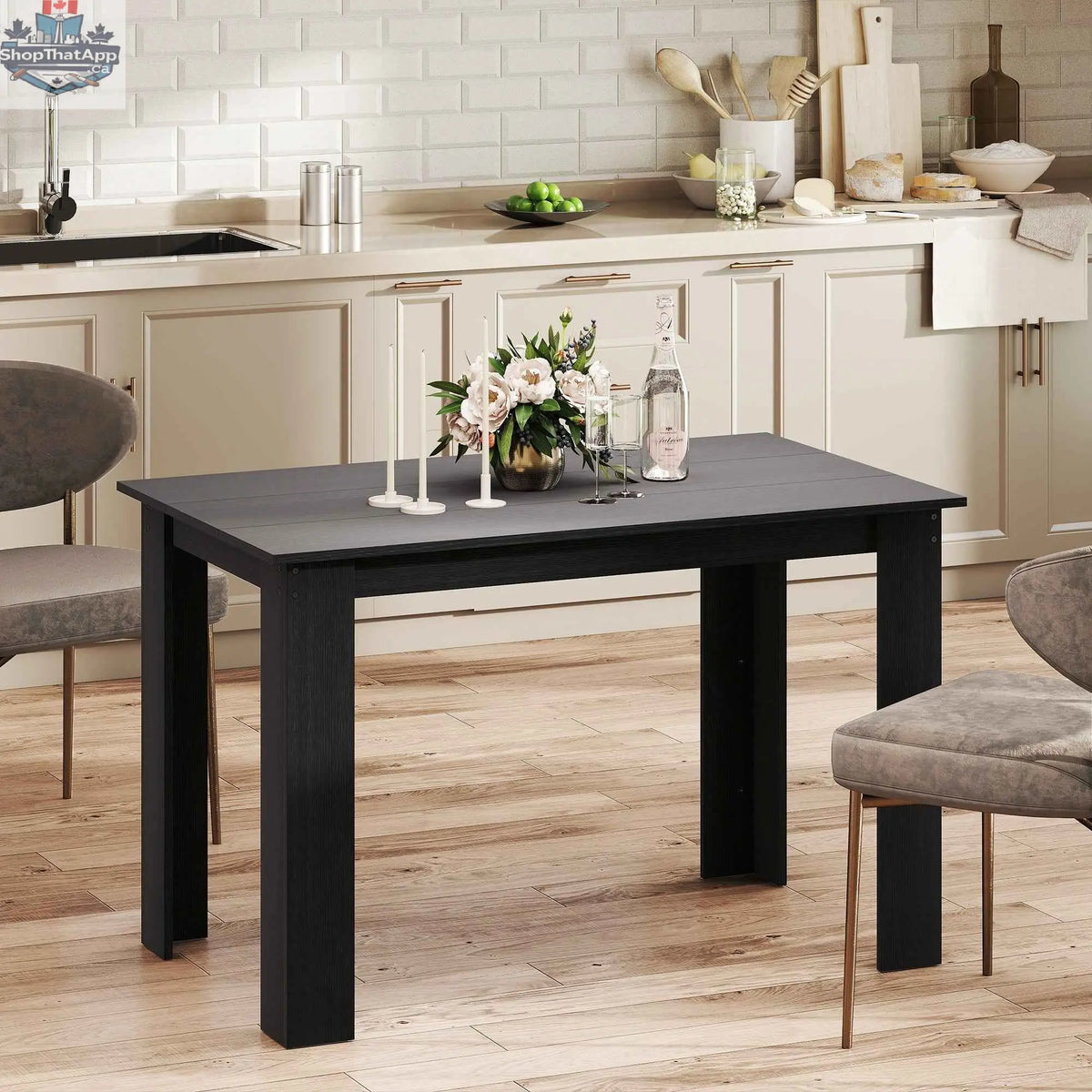 Black 47-inch dining table for 4-6 people by SLOTH Nation, featuring a sleek modern design for kitchen and dining rooms.