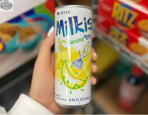 Refreshing Milkis Banana drink in a 250ml bottle by Snack Bar Co, featuring a creamy banana flavor and vibrant beverage label.