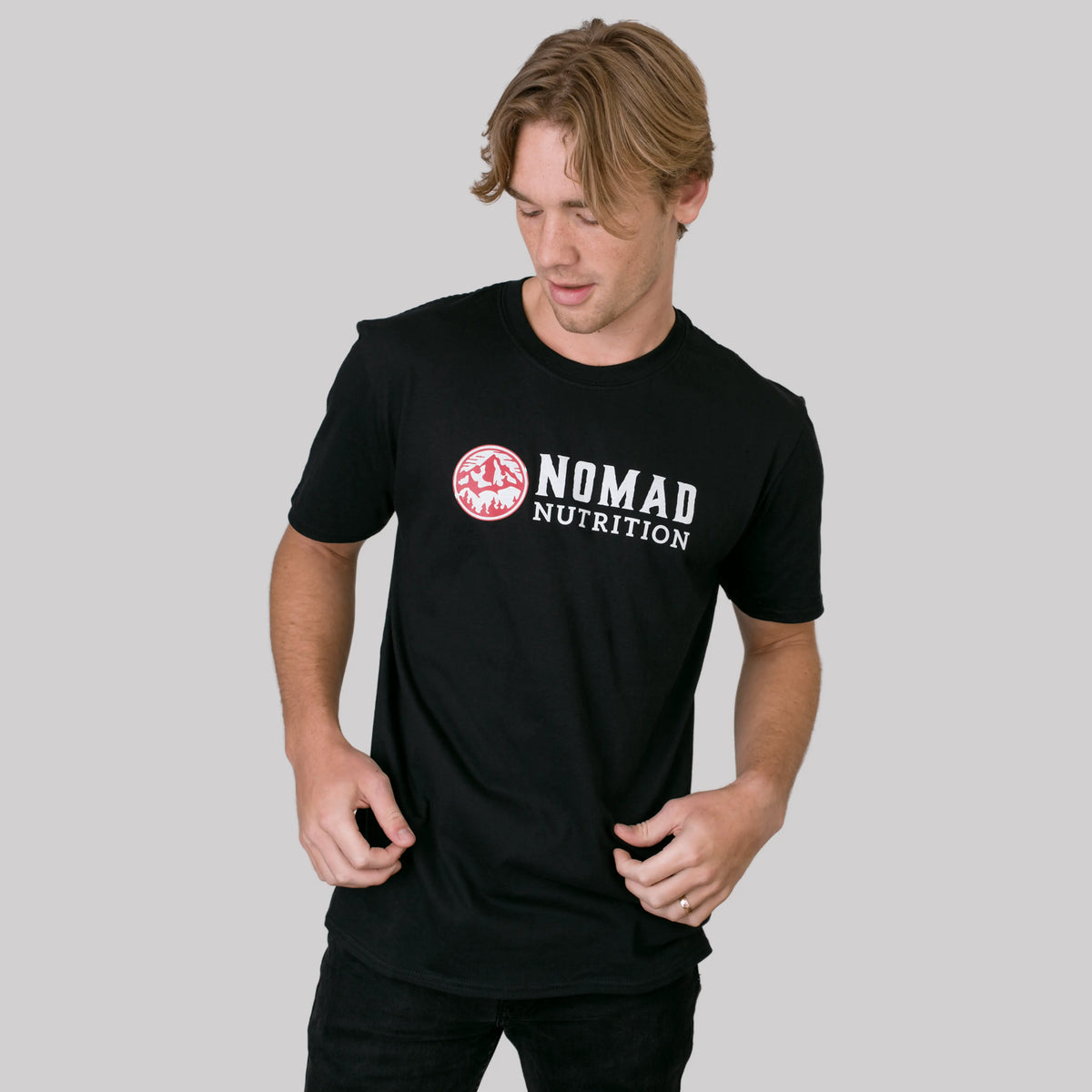 Black Nomad Nutrition logo T-shirt for adventurers, featuring a comfortable fit and stylish design perfect for outdoor enthusiasts.