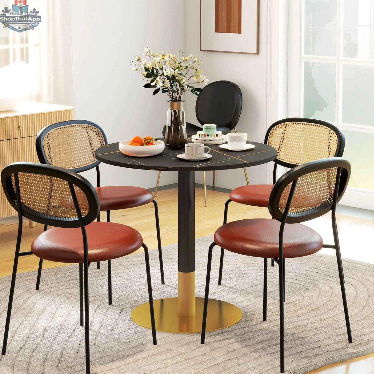 Black Rene round dining table with faux marble top by SLOTH Nation, ideal for small kitchen and dining spaces.