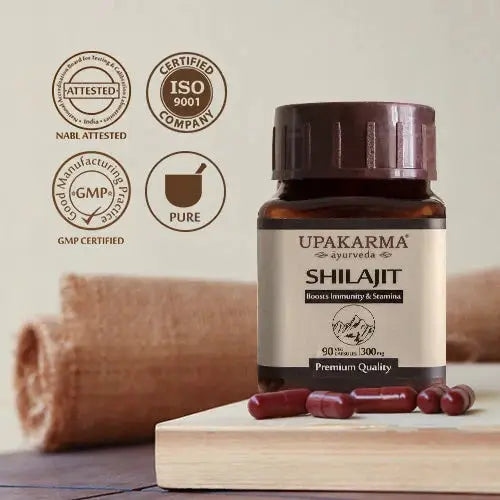 Prithvi Mart Upakarma Ayurveda Pure Shilajit Capsules in a bottle, showing 90 natural Shilajit capsules for health and wellness.