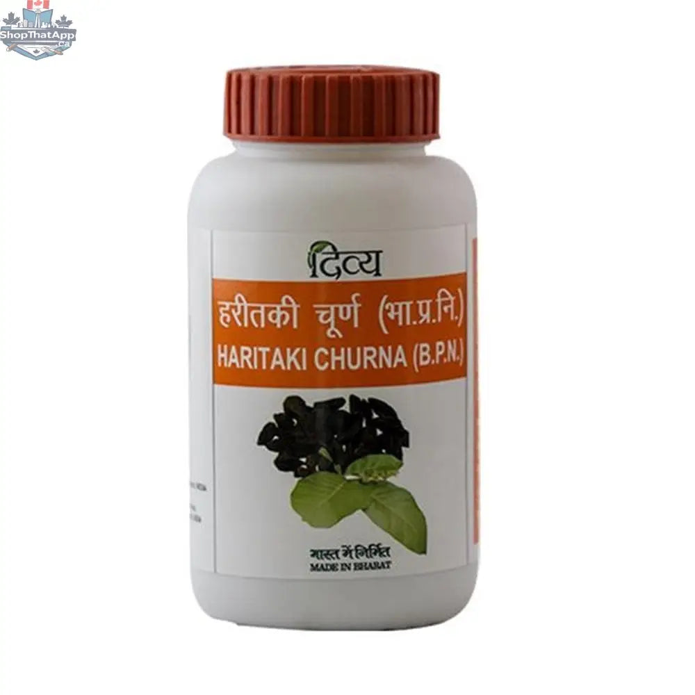 Patanjali Haritaki Churna in a jar, herbal wellness powder by Prithvi Mart, with fresh green haritaki fruit and powder visible.