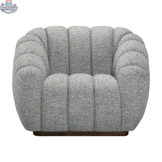 Grey textured boucle Riro swivel accent chair by Hygge Design House with modern, cozy design and swivel base.