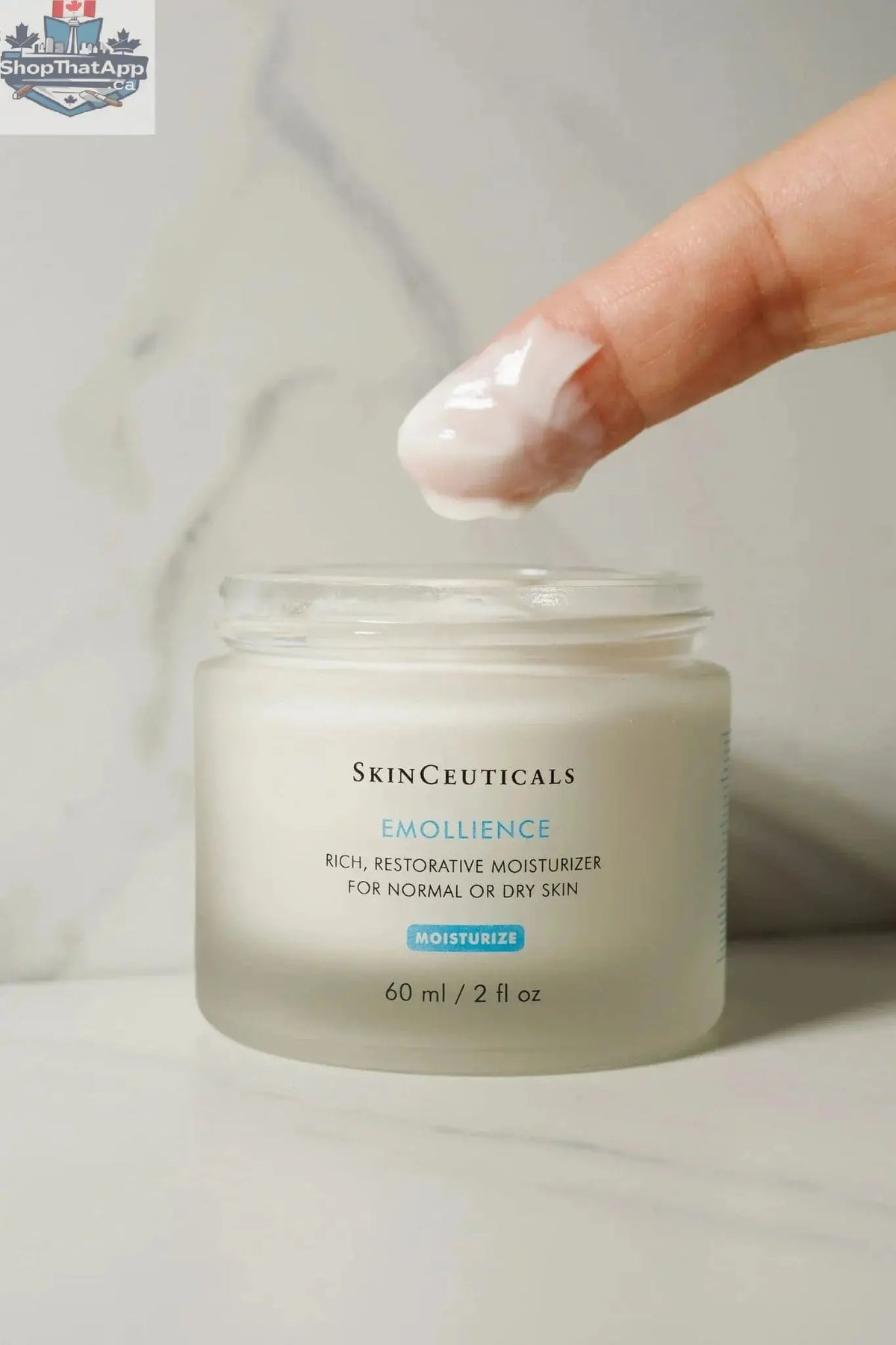 SkinCeuticals Emollience moisturizer for deep hydration and skin softness, shown in a sleek skincare jar.