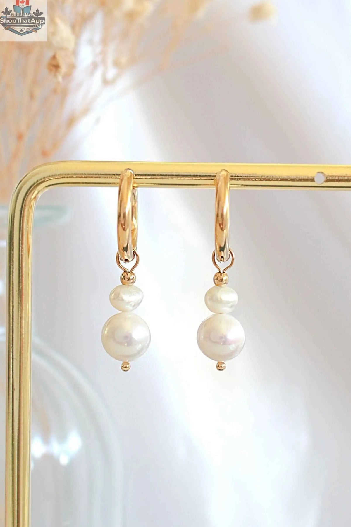Minimalist pearl earrings by SLOTH Nation, elegant fashion accessories with smooth white pearls and simple gold studs.