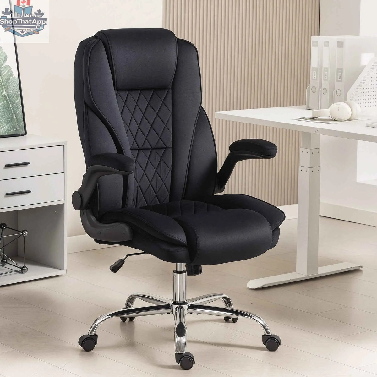 Black Hayden executive office chair with flip-up armrests from SLOTH Nation, featuring a modern ergonomic design.