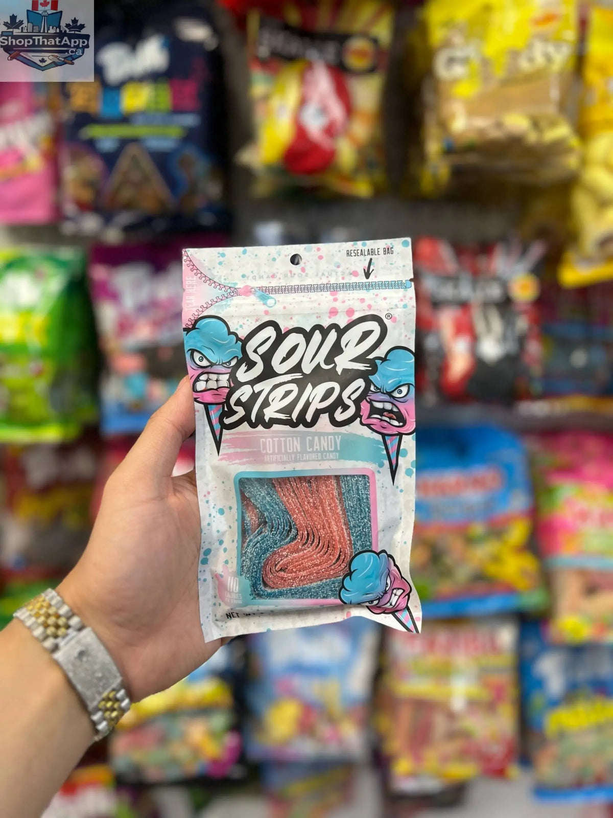 Colorful Sour Strips Cotton Candy candy by Snack Bar Co in a 96g package, showing bright, twisted strips with a sweet and sour appearance.