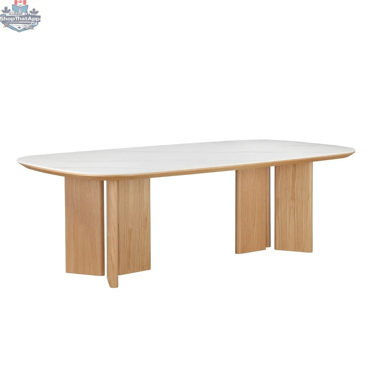 Donton Dining Table by Hygge Design House shown with a wooden tabletop and sturdy metal legs in a modern dining room setting.