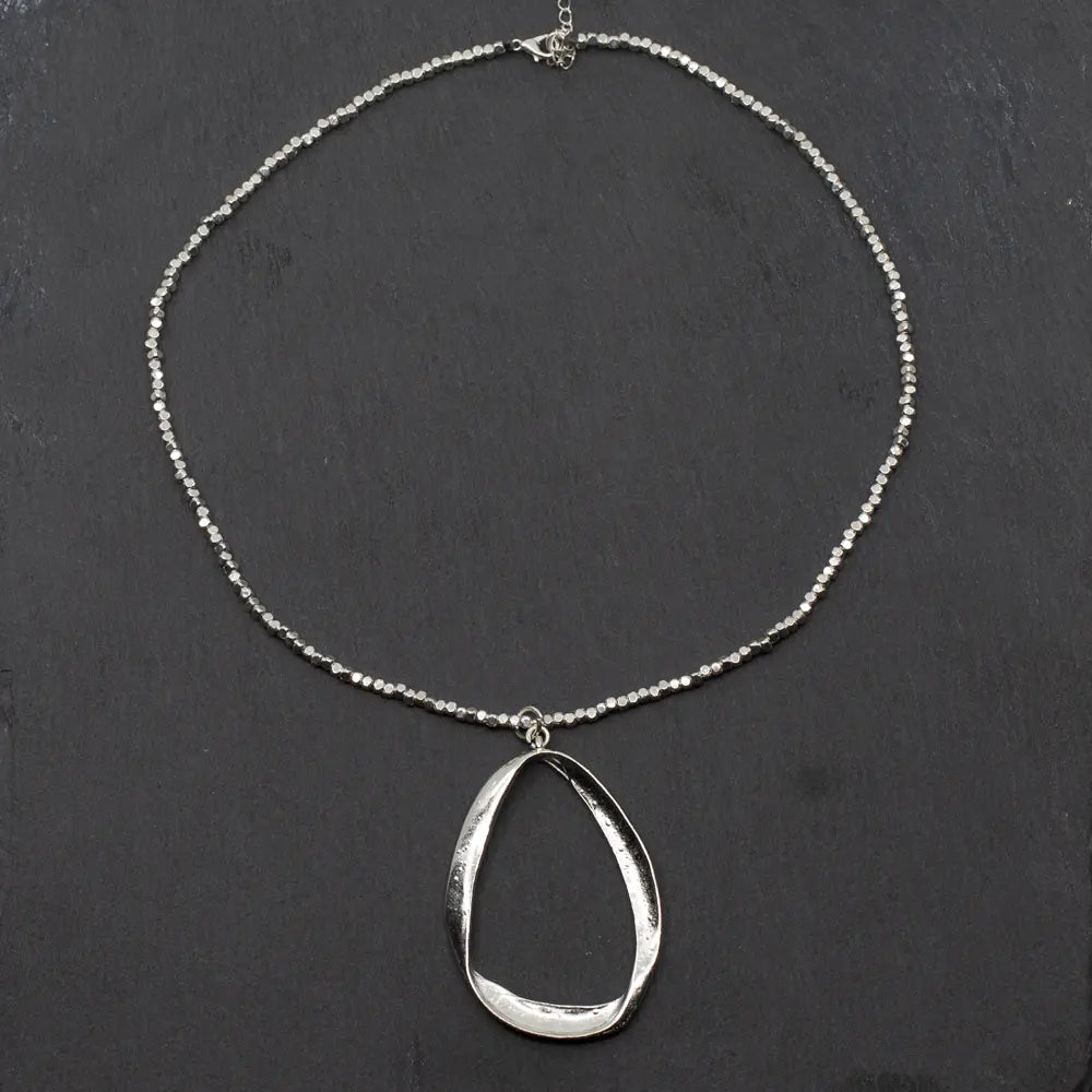 Silver plate twisted oval necklace by Suzie Blue Canada featuring a sleek, elegant design with a polished finish.