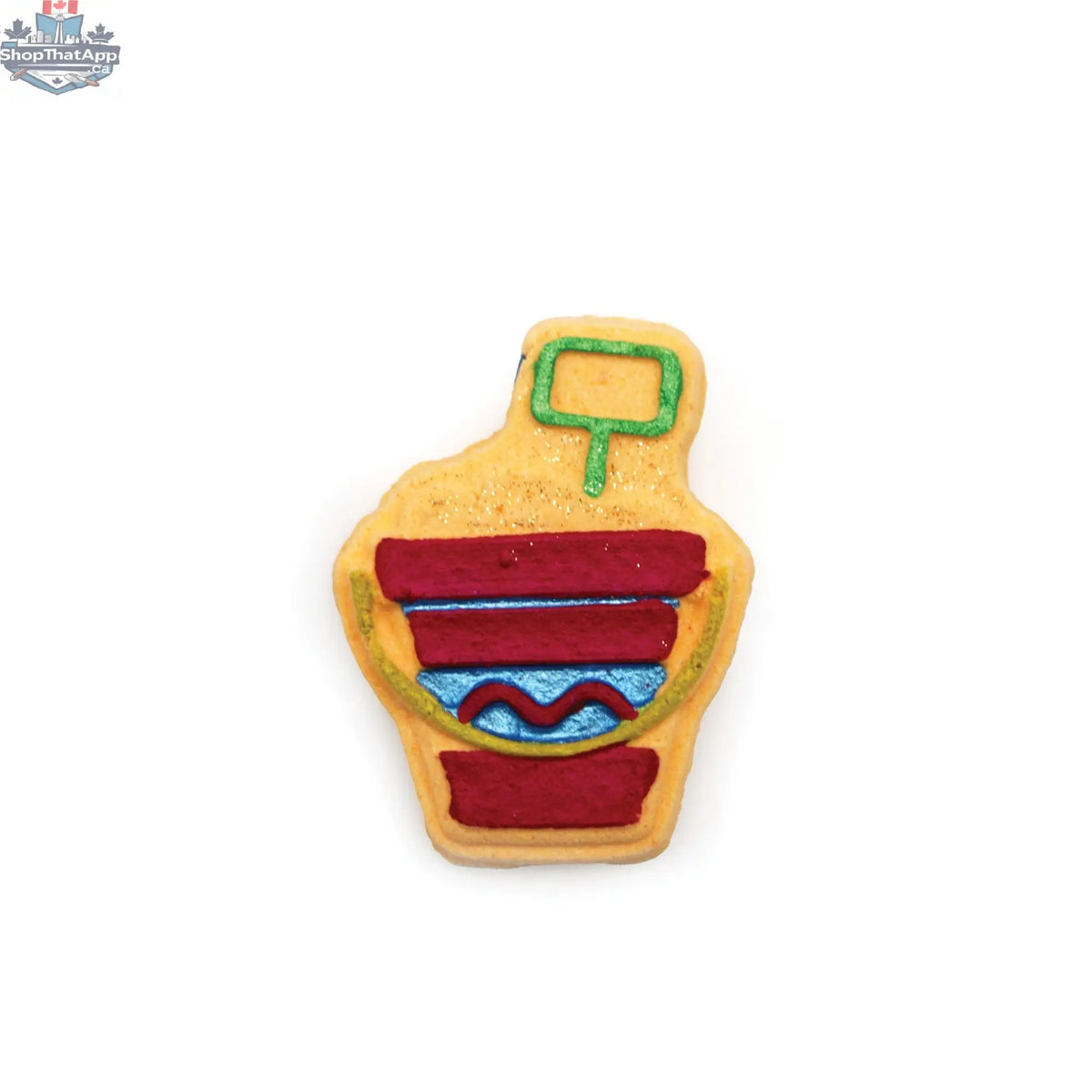 Bath bomb shaped like a sand bucket from The Bomb Bar Canada, colorful and playful for a relaxing bath experience.