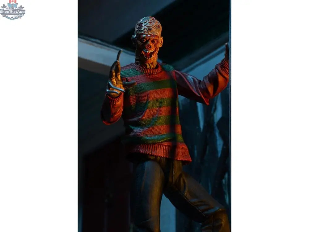 Toy Snowman Freddy Krueger action figure from A Nightmare On Elm Street, detailed collectible toy with iconic horror character features