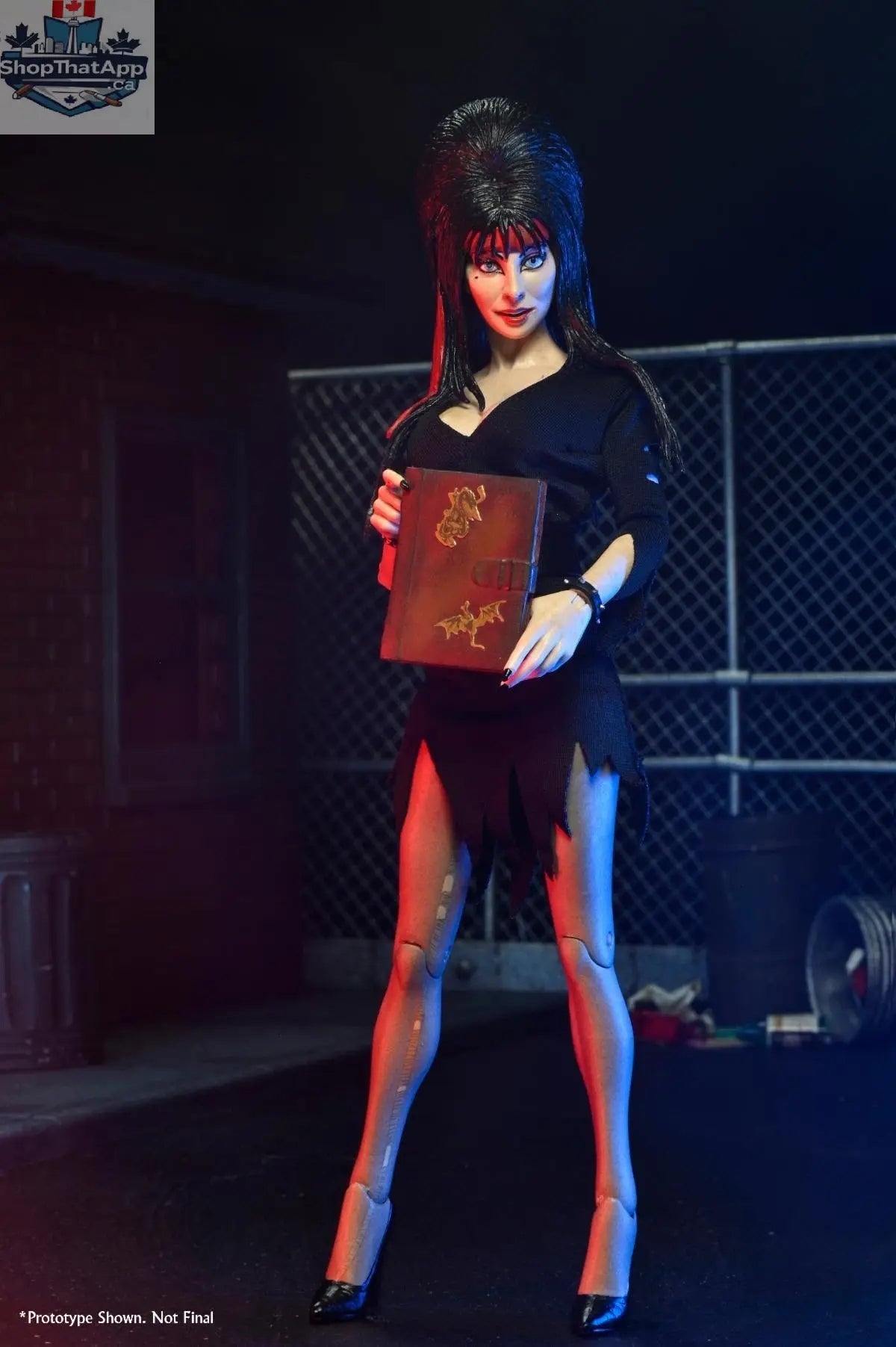 Elvira 8-inch clothed action figure by Toy Snowman, dressed as a commando, detailed collectible toy with military-inspired outfit.