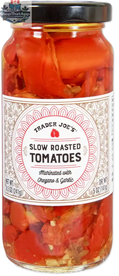 Slow roasted tomatoes in a jar from Vancou-Vert Trading Ltd., showcasing vibrant, caramelized tomatoes in a clear glass container.