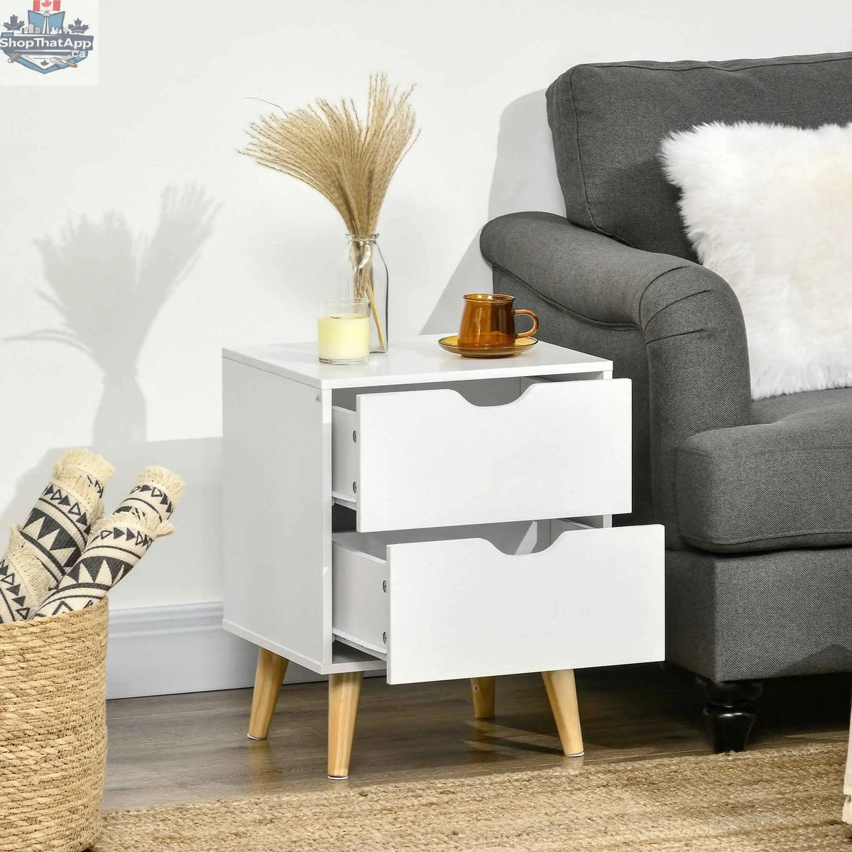 White Jesse nightstand with two drawers and pine wood legs, modern bedroom furniture by SLOTH Nation.