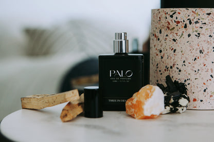 Three Inches High Eau de Parfum Palo bottle with elegant packaging, showcasing a captivating fragrance experience.