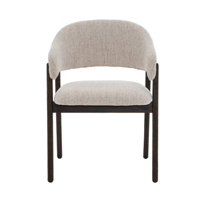 Beige upholstered Fiol dining chair with dirty oak wood frame by Hygge Design House, showcasing a modern, elegant seating option.