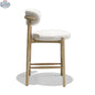 Hygge Design House Orazio Counter Stool with wooden legs and upholstered seat, modern design for kitchen or bar area.