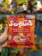 Chewy Squashies Orange Cherry Candy from Snack Bar Co in a clear plastic bag, colorful orange and red candies visible.
