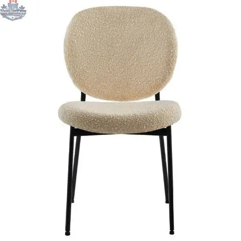 Hygge Design House Sashi Dining Chair in linen boucle fabric with wooden legs, modern and comfortable seating for dining rooms.