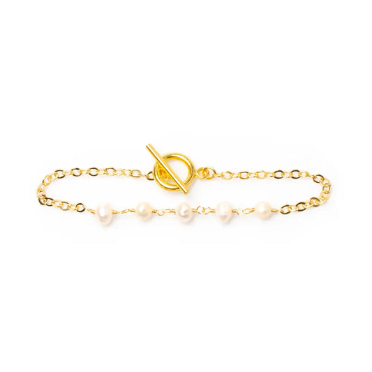 Delicate gold-plated pearl bracelet with chain design, featuring elegant pearls and intricate chain links, by Suzie Blue Canada.