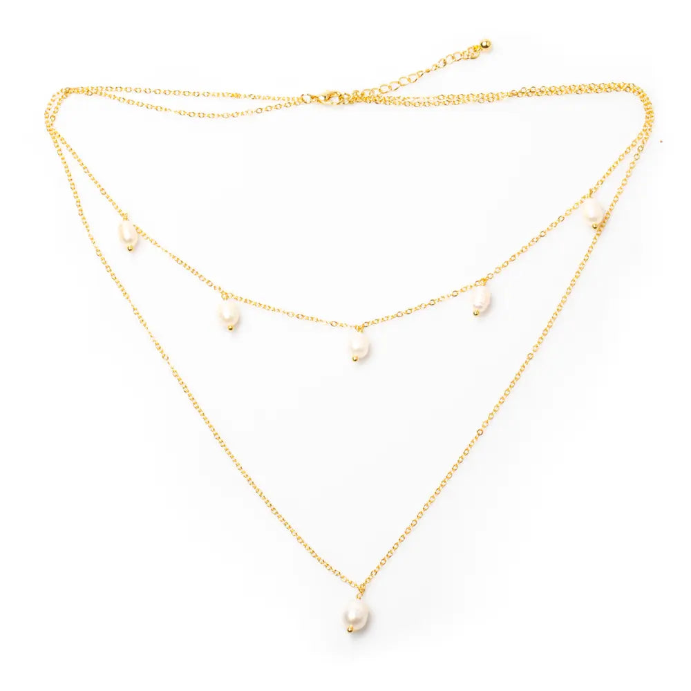 Double strand pearl necklace with gold plated chain from Suzie Blue Canada, featuring lustrous pearls and elegant design.