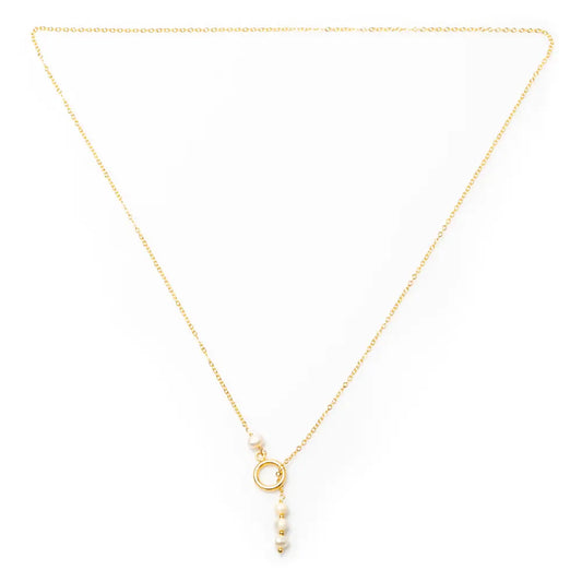 Gold plated triple pearl loop necklace by Suzie Blue Canada featuring elegant pearl accents and a sleek, modern design.