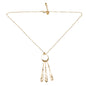 Gold-plated Beaten Triple Tear Drop Necklace by Suzie Blue Canada featuring layered teardrop pendants on a delicate chain.
