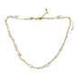 Gold heart chain necklace with white beads, plated in gold, by Suzie Blue Canada, featuring a delicate and stylish design.
