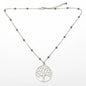 Silver plated Tree of Life pendant necklace on ball chain by Suzie Blue Canada, featuring a detailed tree design.