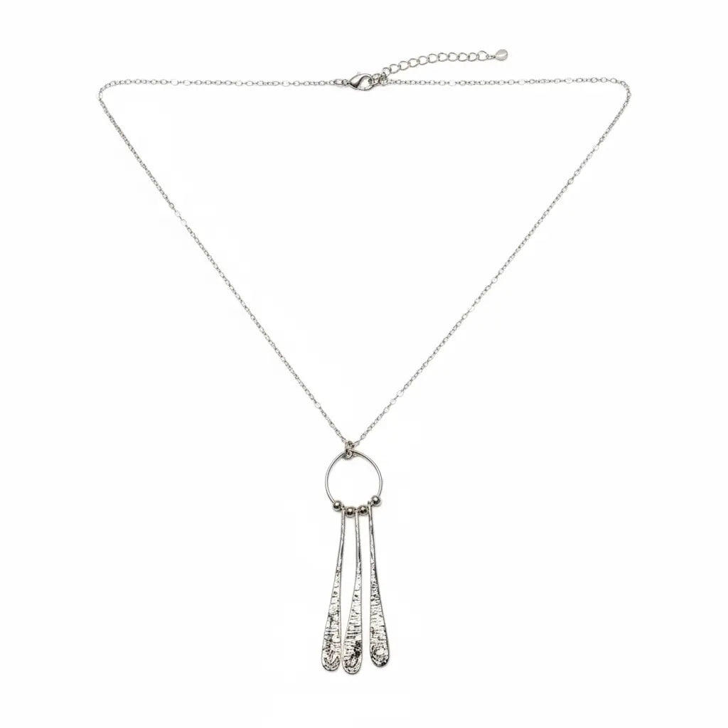 Silver-plated Beaten Triple Long Tear Drop Necklace by Suzie Blue Canada featuring cascading tear-shaped pendants.