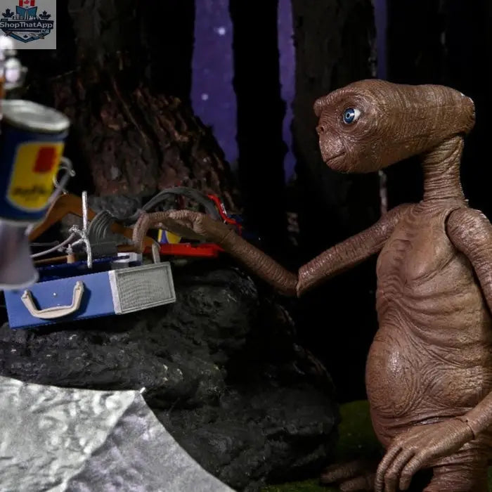Toy Snowman NECA E.T. 40th Anniversary action figure with LED light-up chest, detailed collectible toy from the alien movie series.