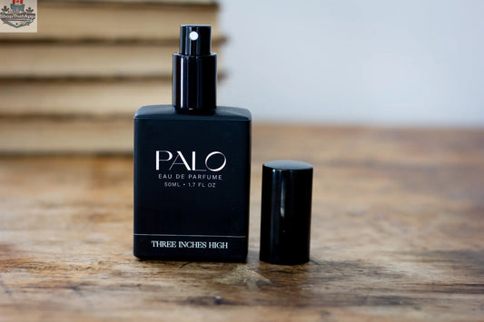 Elegant bottle of Three Inches High Palo Eau de Parfum with a sleek design and captivating fragrance, displayed against a neutral background.