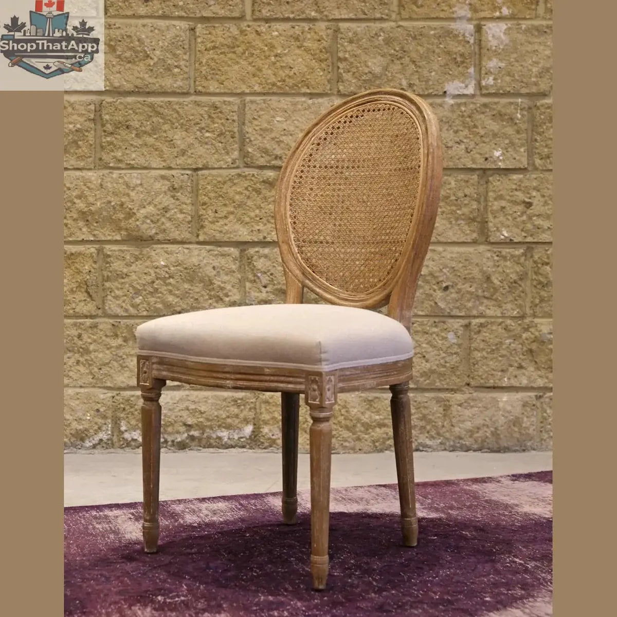 Hygge Design House Napoleon dining chair with cane back and antique linen upholstery, showcasing elegant craftsmanship and classic style.