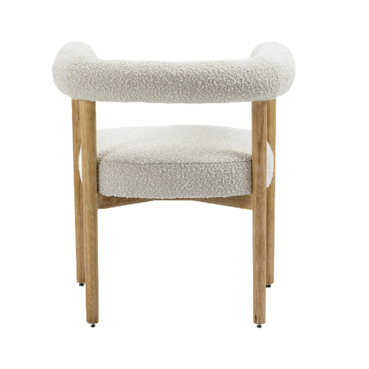 Cream Svea Boucle Dining Chair by Hygge Design House with tufted upholstery and wooden legs, modern and stylish for dining rooms.