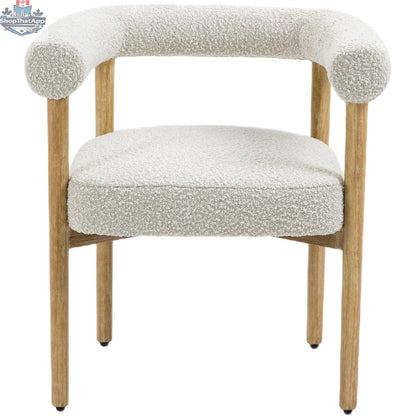 Elegant Hygge Design House Oslo Cream Dining Chair with plush upholstered seat and sleek wooden legs.