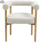 Elegant Hygge Design House Oslo Cream Dining Chair with plush upholstered seat and sleek wooden legs.