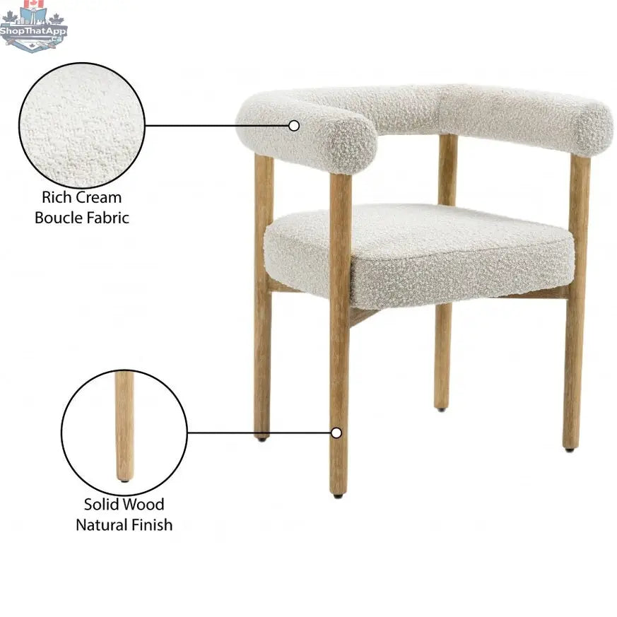 Cream Svea Boucle Dining Chair by Hygge Design House with plush boucle upholstery and modern wooden legs.