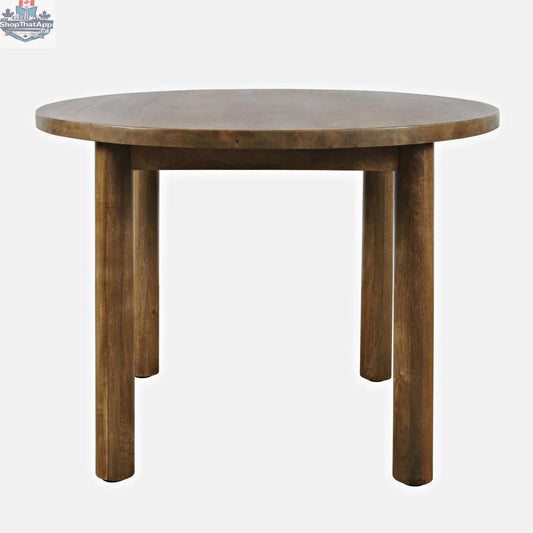 Hygge Design House Frigg round dining table with wooden finish, shown from the front view, perfect for modern dining rooms.