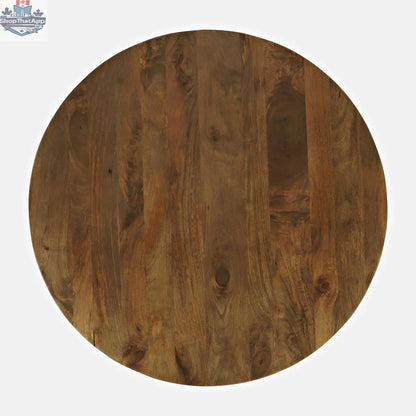 Hygge Design House Frigg round dining table with wooden surface, ideal for modern kitchen or dining room settings.