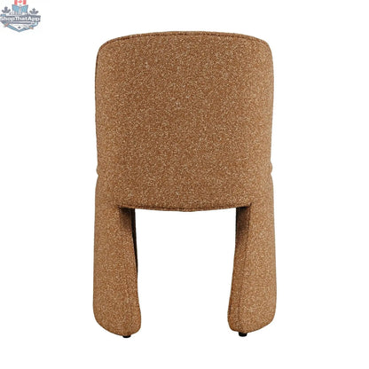 Hygge Design House Soma dining chair with beige upholstery and wooden legs, stylish and comfortable for modern dining spaces.
