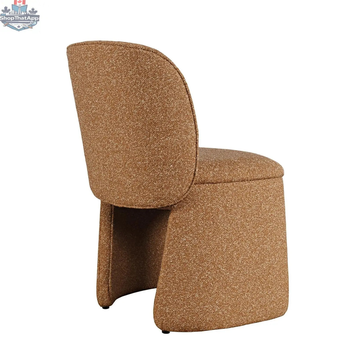 Hygge Design House Soma dining chair with beige upholstered seat and dark wooden legs, shown from back angle in a modern dining room.