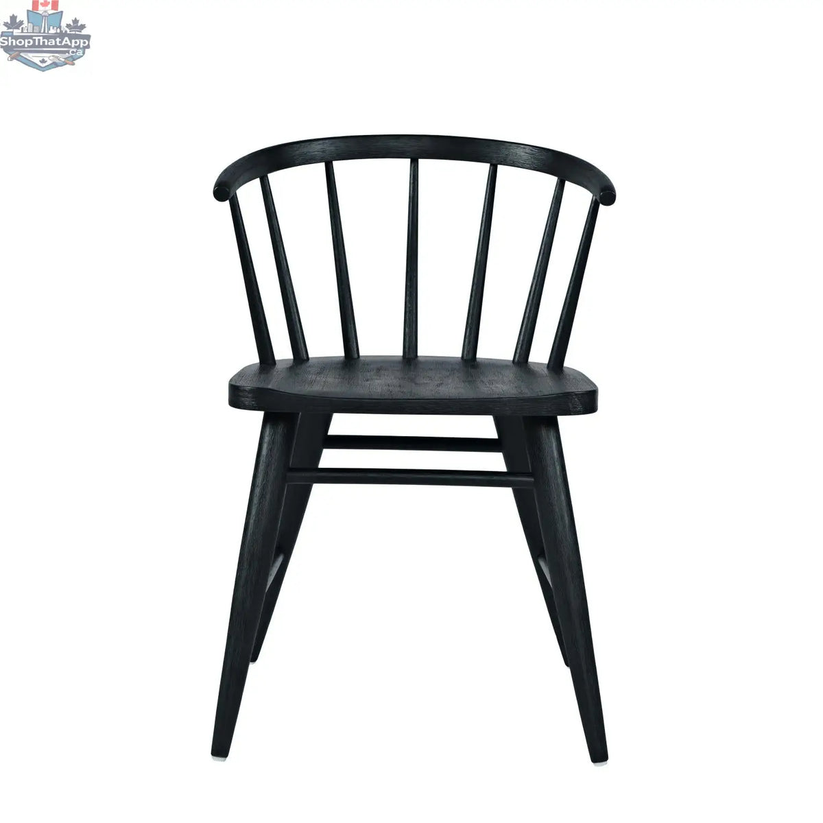 Fitz dining chair by Hygge Design House featuring a sleek black upholstered seat and modern wooden legs.