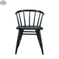 Fitz dining chair by Hygge Design House featuring a sleek black upholstered seat and modern wooden legs.